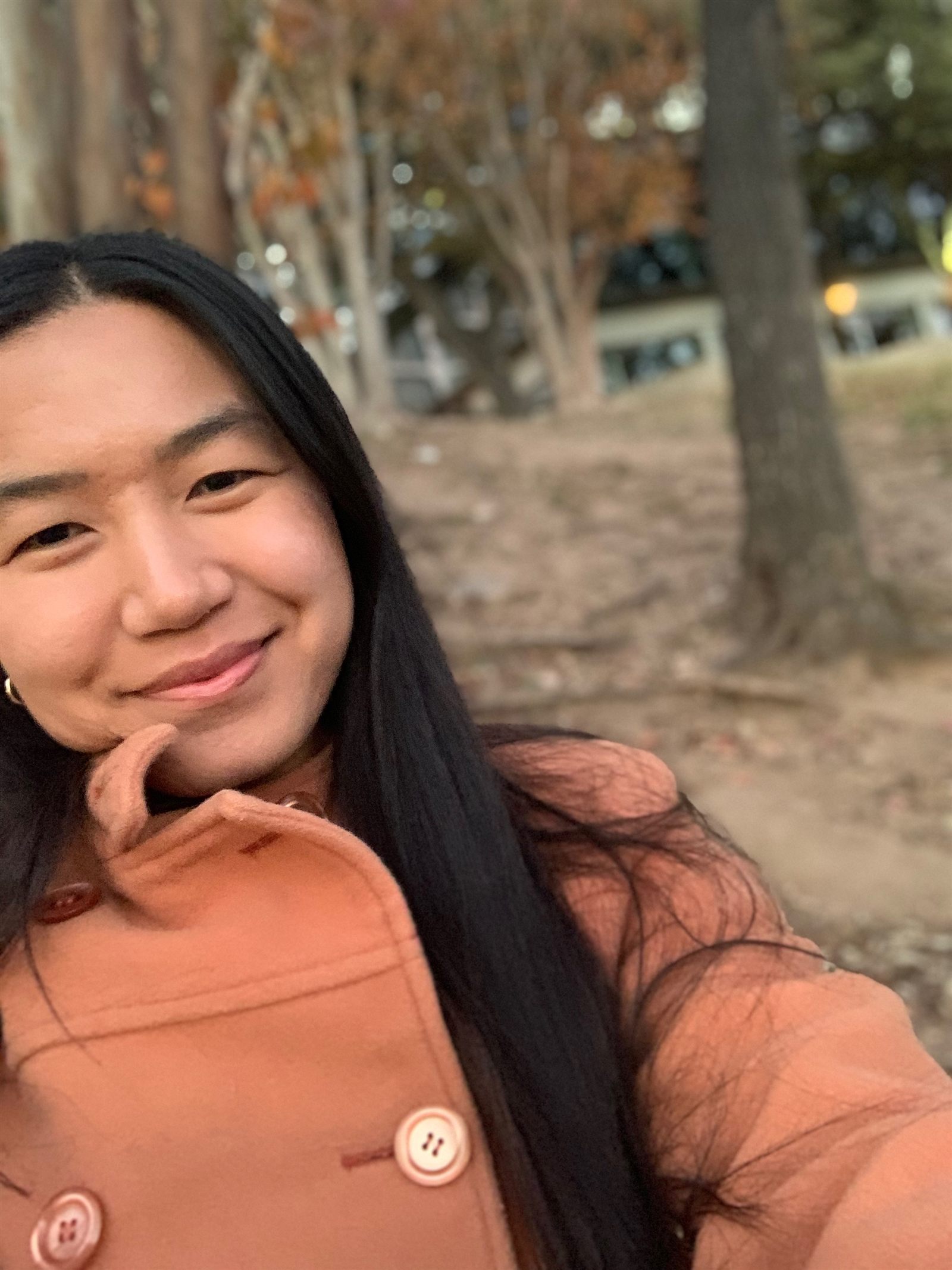 Hannah smiling outdoors
